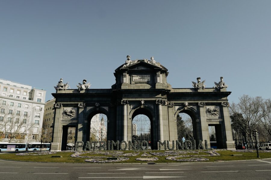 a large building with statues on top of it